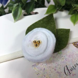 White flower to decorate babies head made with felt